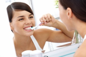 bigstock-Image-of-pretty-female-brushin-33981722
