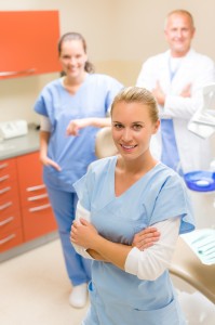 bigstock-Portrait-of-dental-team-female-38614084